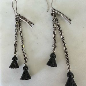 Diesel carved horn tasseled and tagged  925 silver earring . A rare find.